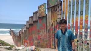 Mexican tourist guide Isao Iwasaki guides at the Tijuana border